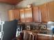 Kitchen featuring wood cabinets and a small sink at 3913 Stough Sw Rd, Concord, NC 28027