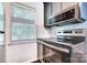 Kitchen features stainless steel appliances, dark gray countertops, and white tile backsplash at 3919 Briarhill Dr, Charlotte, NC 28215