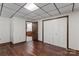 Finished basement offers a large closet, wood flooring, and kitchenette access at 3943 Peggy Ln, Mint Hill, NC 28227