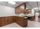 Basement kitchen features vintage style cabinets, a sink and a range at 3943 Peggy Ln, Mint Hill, NC 28227