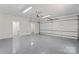 Spacious garage with epoxy floors, access doors, and an automatic door opener at 3943 Peggy Ln, Mint Hill, NC 28227