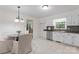Eat-in kitchen boasts stainless steel appliances, granite countertops, and ample natural light at 3943 Peggy Ln, Mint Hill, NC 28227