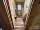 Cozy bathroom with decor, woodgrain-look floors, and a shower-tub combo at 407 Alton St, Monroe, NC 28110