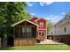 Charming backyard with screened-in porch and patio area, perfect for outdoor relaxation and entertaining at 423 Solomon St, Charlotte, NC 28216
