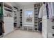 Spacious walk-in closet with custom shelving and a window at 423 Solomon St, Charlotte, NC 28216