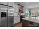 Modern kitchen featuring stainless steel appliances, granite countertops, and ample cabinet space at 423 Solomon St, Charlotte, NC 28216
