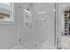 Modern walk-in shower with white subway tile and a glass enclosure at 423 Solomon St, Charlotte, NC 28216
