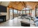 Spacious sunroom featuring tiled floors, wood ceiling, comfortable seating, and lots of natural light at 423 Solomon St, Charlotte, NC 28216