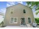 A home's exterior featuring a deck, neutral siding, and large windows at 4462 Kellybrook Dr, Concord, NC 28025