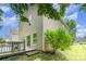 A home's exterior featuring a deck, neutral siding, and large windows at 4462 Kellybrook Dr, Concord, NC 28025