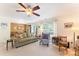 Inviting living room with comfortable seating, neutral walls, and open access to the dining area at 4462 Kellybrook Dr, Concord, NC 28025