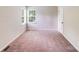 Bedroom featuring carpeted floors, neutral walls, and a window at 5417 Timbertop Ln, Charlotte, NC 28215