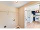 Picture of the laundry room with washer and dryer hookups, and view into the kitchen at 5417 Timbertop Ln, Charlotte, NC 28215