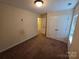 Comfortable bedroom featuring neutral paint, carpet flooring, and a closet for storage at 550 Baker Mill Rd, Cleveland, NC 27013