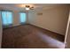 Generously sized bedroom with abundant light and wall to wall carpet at 550 Baker Mill Rd, Cleveland, NC 27013