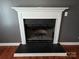 Classic fireplace with white mantle, adding warmth and elegance to the home at 550 Baker Mill Rd, Cleveland, NC 27013