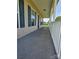 Inviting covered front porch, ideal for relaxing and enjoying the outdoors at 550 Baker Mill Rd, Cleveland, NC 27013