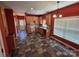 Bright kitchen with a sunlit window, lots of cabinets and stylish tile flooring at 550 Baker Mill Rd, Cleveland, NC 27013