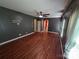 Spacious living room featuring hardwood floors, recessed lighting, and arched doorways at 550 Baker Mill Rd, Cleveland, NC 27013