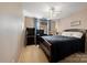 Comfortable bedroom with neutral walls, ceiling fan, and soft carpet flooring at 6340 Ziegler Ln # 148-A, Charlotte, NC 28269