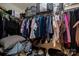 Organized walk-in closet with ample hanging space and shelving for storage at 6340 Ziegler Ln # 148-A, Charlotte, NC 28269