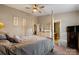 Inviting main bedroom featuring a four-poster bed, ample dresser storage, and a sitting area at 6340 Ziegler Ln # 148-A, Charlotte, NC 28269