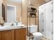 Well-organized bathroom with modern fixtures and ample storage shelving at 6601 Charlotte Hwy, York, SC 29745