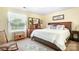 Cozy bedroom featuring a large window and traditional furnishings at 6601 Charlotte Hwy, York, SC 29745