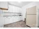 Functional kitchen with white cabinets, a large sink, and ample countertop space at 6601 Charlotte Hwy, York, SC 29745