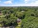 Stunning aerial view of a wooded property with beautiful landscaping and mature trees at 747 9Th Nw St, Hickory, NC 28601