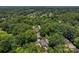 Lush green canopy surrounds this neighborhood in this aerial view at 747 9Th Nw St, Hickory, NC 28601