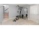 Finished basement with exercise equipment, a mirrored closet, and a patterned area rug at 747 9Th Nw St, Hickory, NC 28601