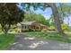 Inviting exterior view of a brick home with a well-manicured lawn and mature trees at 747 9Th Nw St, Hickory, NC 28601