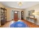 Inviting foyer with hardwood floors, elegant decor, and a beautiful front door at 747 9Th Nw St, Hickory, NC 28601
