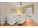 Cozy living room with a comfortable white sofa and unique sliding glass doors at 747 9Th Nw St, Hickory, NC 28601