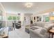 Open-concept living area with a cozy fireplace and a seamless transition to the kitchen at 747 9Th Nw St, Hickory, NC 28601