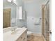 Well-maintained bathroom featuring a glass shower, vanity with sink, and tile flooring at 9000 Whirlaway Ln, Waxhaw, NC 28173