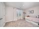 Cozy bedroom with a bright window view and carpeted floors for a comfortable living space at 9311 Dunwich Dr, Gastonia, NC 28056