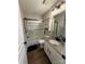 Bathroom boasts tub-shower combo with glass door, sleek fixtures, and a functional vanity at 1013 Park West Dr # 5, Charlotte, NC 28209