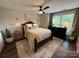 Inviting bedroom with a comfortable bed, modern decor, and ample natural light at 1013 Park West Dr # 5, Charlotte, NC 28209