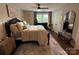 Serene bedroom with hardwood floors, neutral decor, and a comfortable bed at 1013 Park West Dr # 5, Charlotte, NC 28209