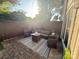Cozy outdoor patio featuring stylish furniture and string lights for evening enjoyment at 1013 Park West Dr # 5, Charlotte, NC 28209