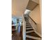 Open staircase with hardwood treads and white risers leading to the upper level at 1013 Park West Dr # 5, Charlotte, NC 28209