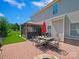 Beautiful backyard with gazebo, outdoor kitchen, and a brick patio at 10409 Dominion Village Dr, Charlotte, NC 28269