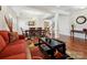 Spacious living area seamlessly blending a cozy living room and elegant dining space at 10409 Dominion Village Dr, Charlotte, NC 28269