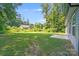 Expansive backyard featuring a cozy patio area perfect for outdoor enjoyment and entertaining at 115 Dove Sw Ave, Concord, NC 28025