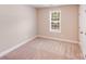 Bright bedroom with a window and closet at 115 Dove Sw Ave, Concord, NC 28025