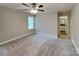 Comfortable bedroom with en-suite bathroom and a ceiling fan at 115 Dove Sw Ave, Concord, NC 28025