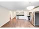Bright eat-in kitchen features stainless steel appliances and a seamless flow to the living spaces at 115 Dove Sw Ave, Concord, NC 28025