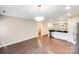 Bright eat-in kitchen features stainless steel appliances and a seamless flow to the living spaces at 115 Dove Sw Ave, Concord, NC 28025